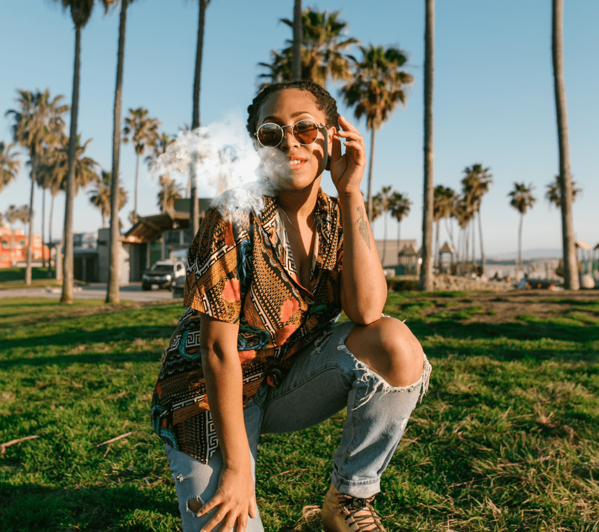Woman smoking on California waterfront