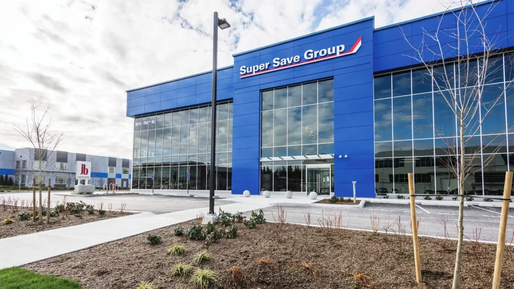 Image of blue Super Save Group building taken from front parking lot