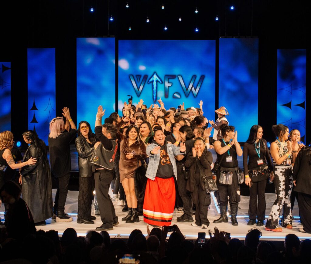 VIFW team members celebrating on the runway after the event